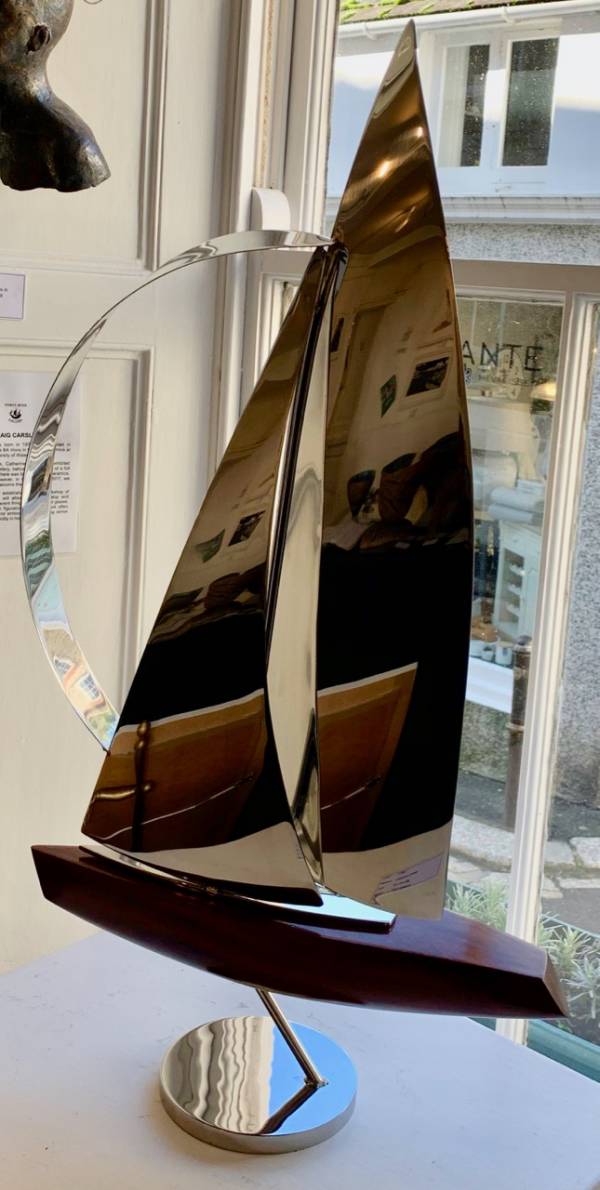 - a Sculpture by John Mellows, measuring 80 x 43 cm (H x W) £875